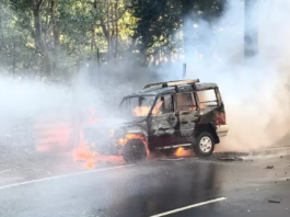 Vehicle Blaze Causes Major Traffic Disruption on Tirumala Second Ghat Road Tirumala Taxi fire erupted